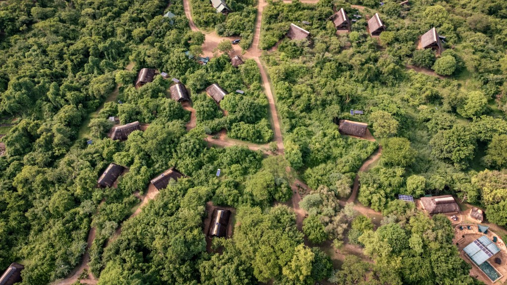 Side-by-side look at budget tented camp and luxury lodge near Murchison Falls