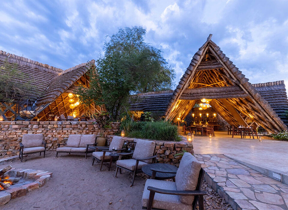 Safari lodge deck and thatched rooms near Murchison Falls National Park