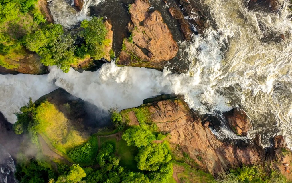 Powerful Nile water forced through the narrow gorge at the top of Murchison Falls